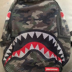 Spray ground backpack